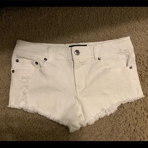 Distressed white shorts